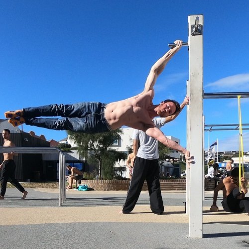 Nathan Leith demonstrates calisthenics full human flag at Bondi